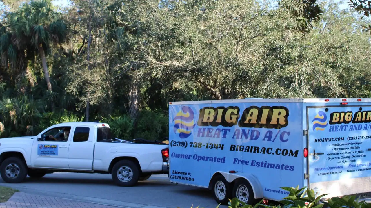 Big Air Heat and AC branded truck and trailer arriving at a Fort Myers home for HVAC service